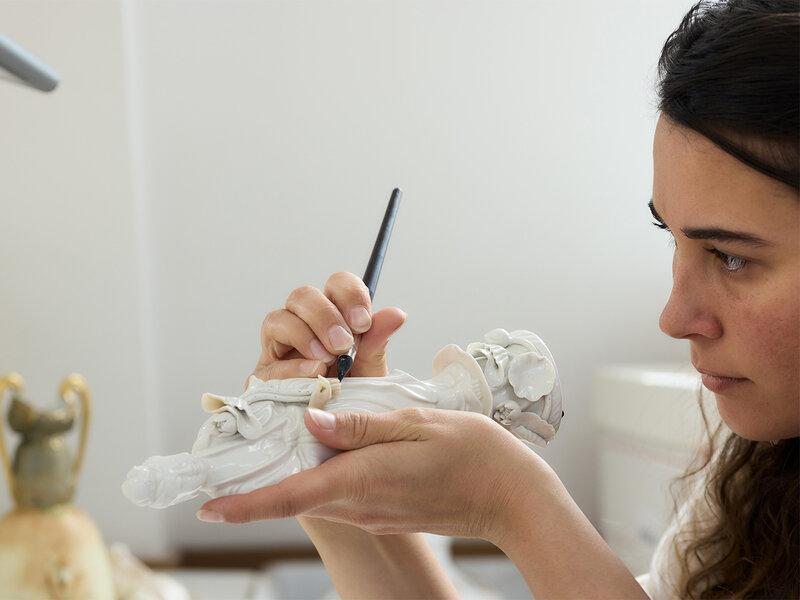 Professional restoration of an antique porcelain figurine