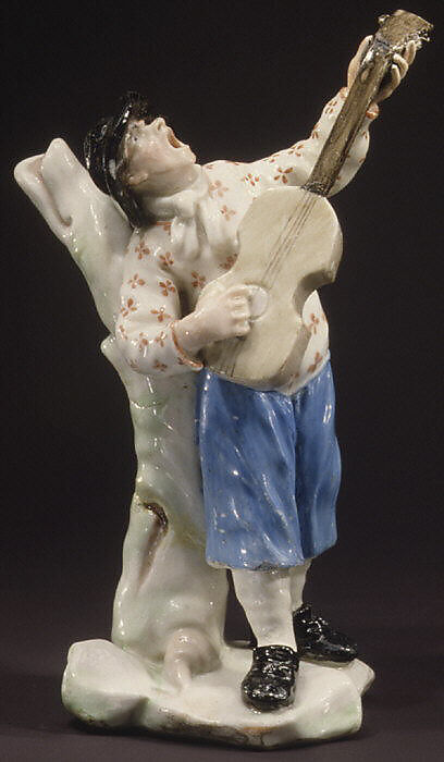Capodimonte porcelain guitarist figurine
