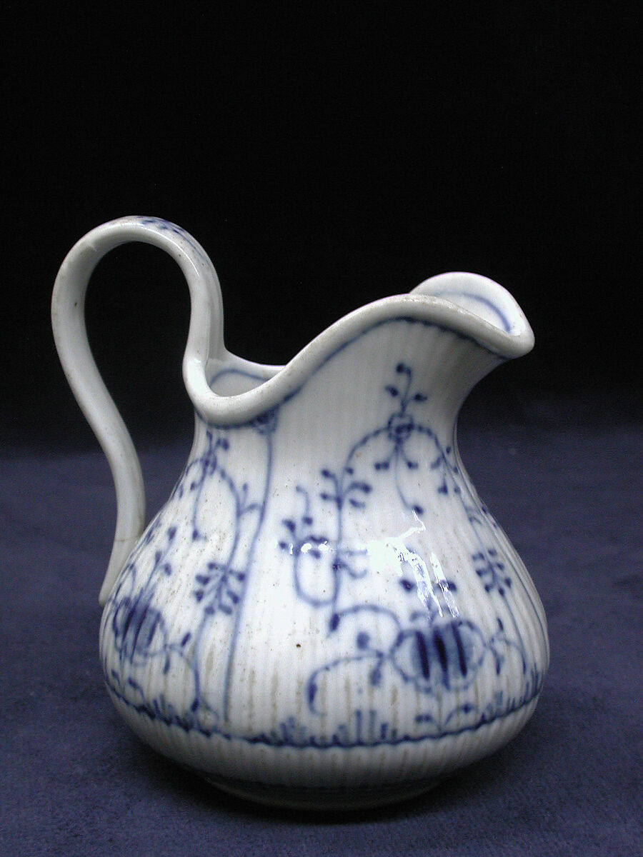 Antique Bohemian blue and white porcelain pitcher from the 19th century