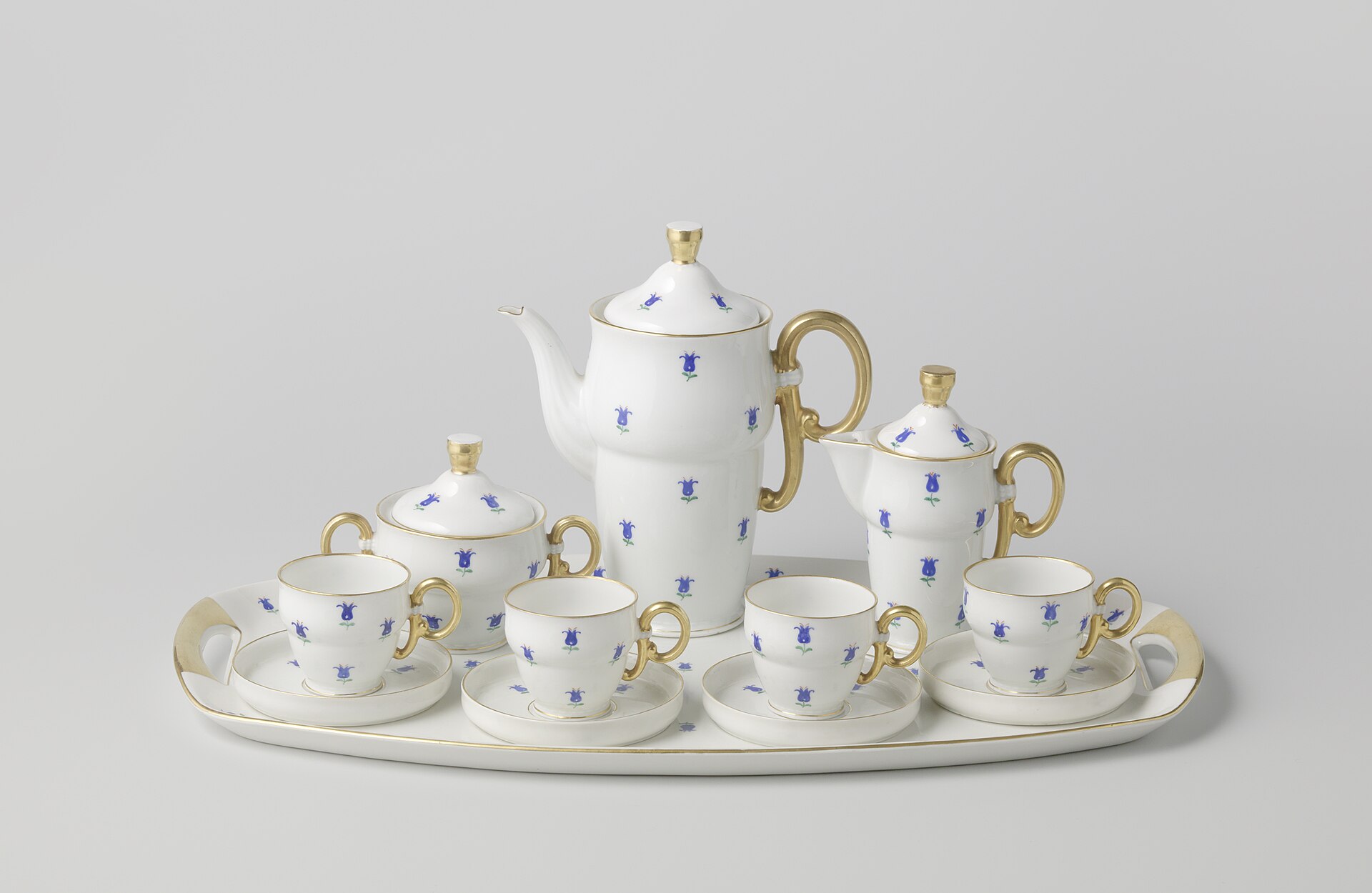Antique Bohemian porcelain coffee set with gilded decoration