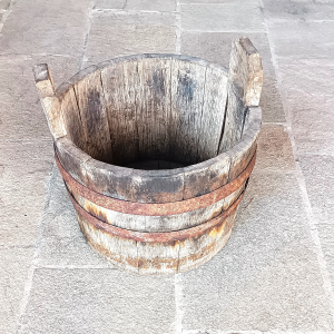 Antique Bulgarian Balkan coopered wooden vessel with two raised handles and riveted iron hoops, 19th century