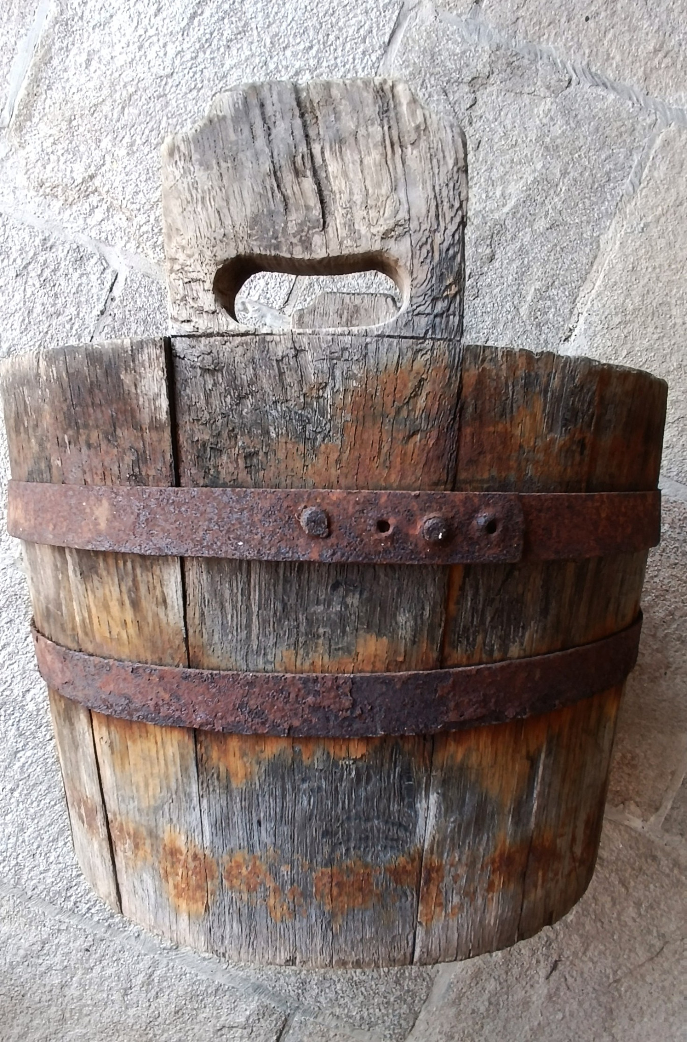 Antique Bulgarian Balkan coopered wooden vessel with hand-cut lug handle and riveted iron hoops, 19th century