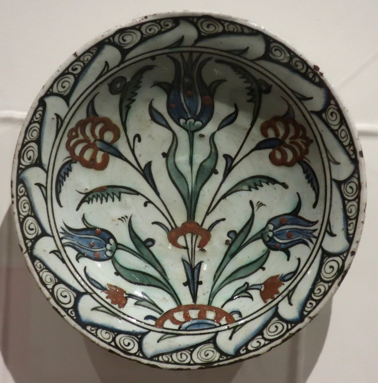 Antique Ottoman Turkish ceramic plate with tulip decoration from the 17th century