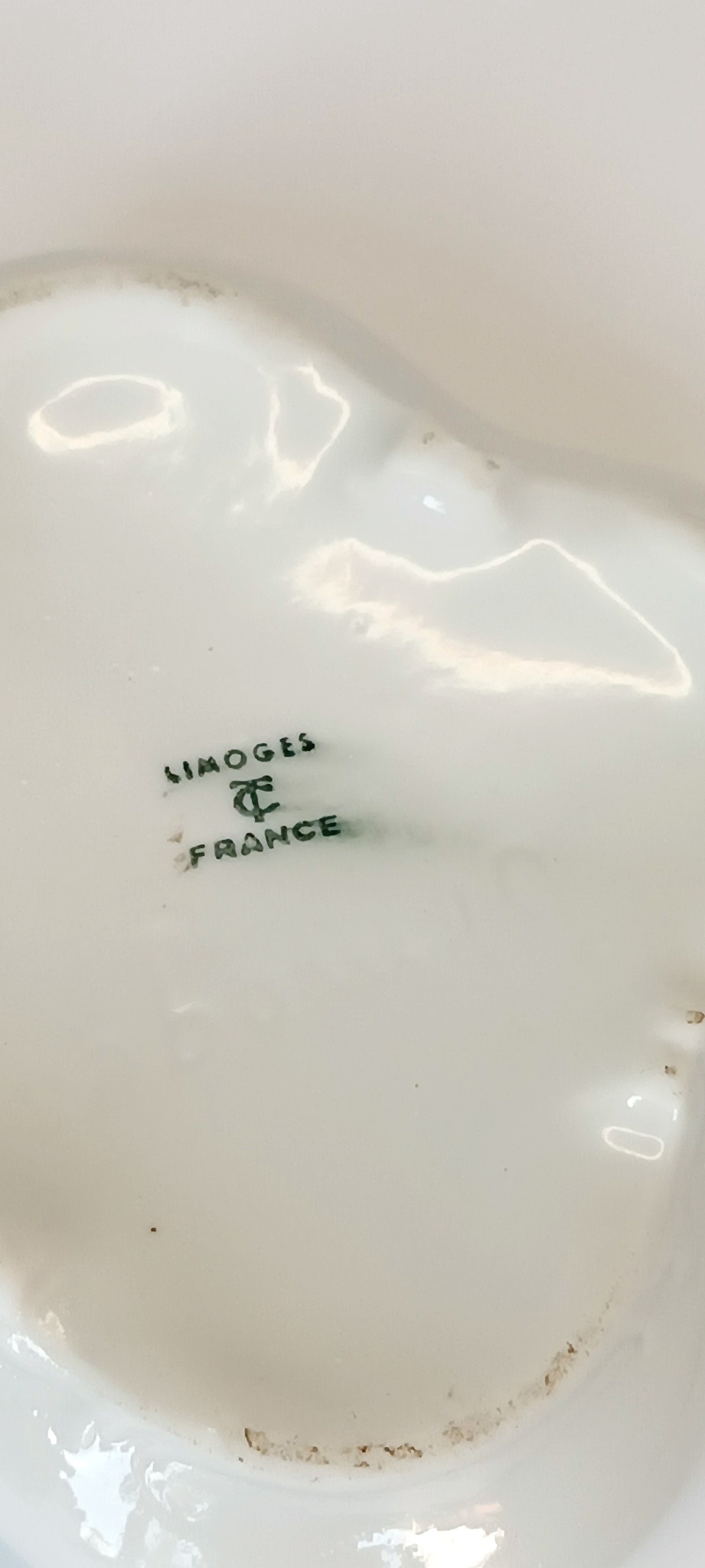 Green Limoges France factory mark on the base of a vintage porcelain anniversary box