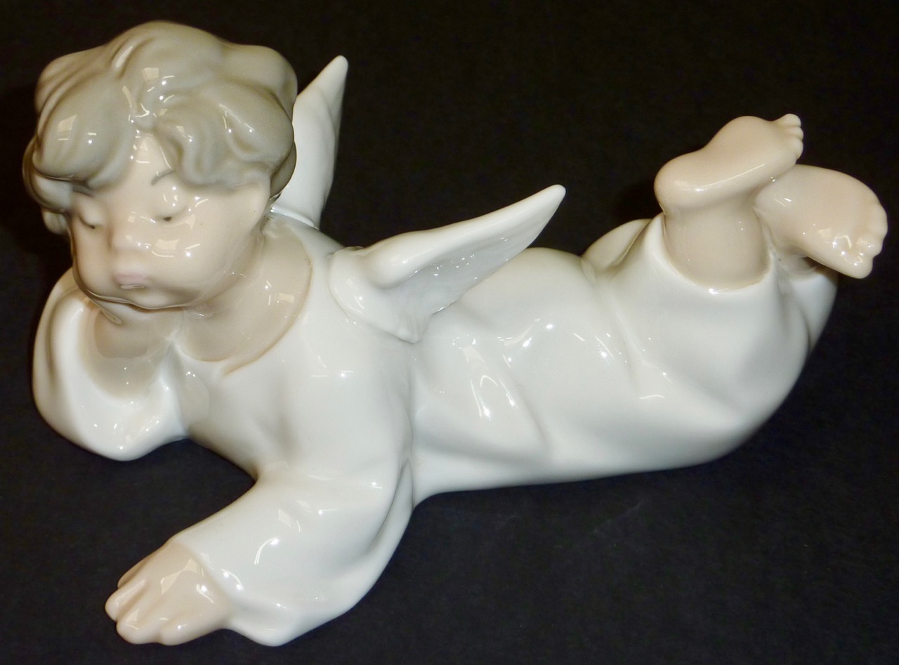 Lladró porcelain angel figurine with glazed finish