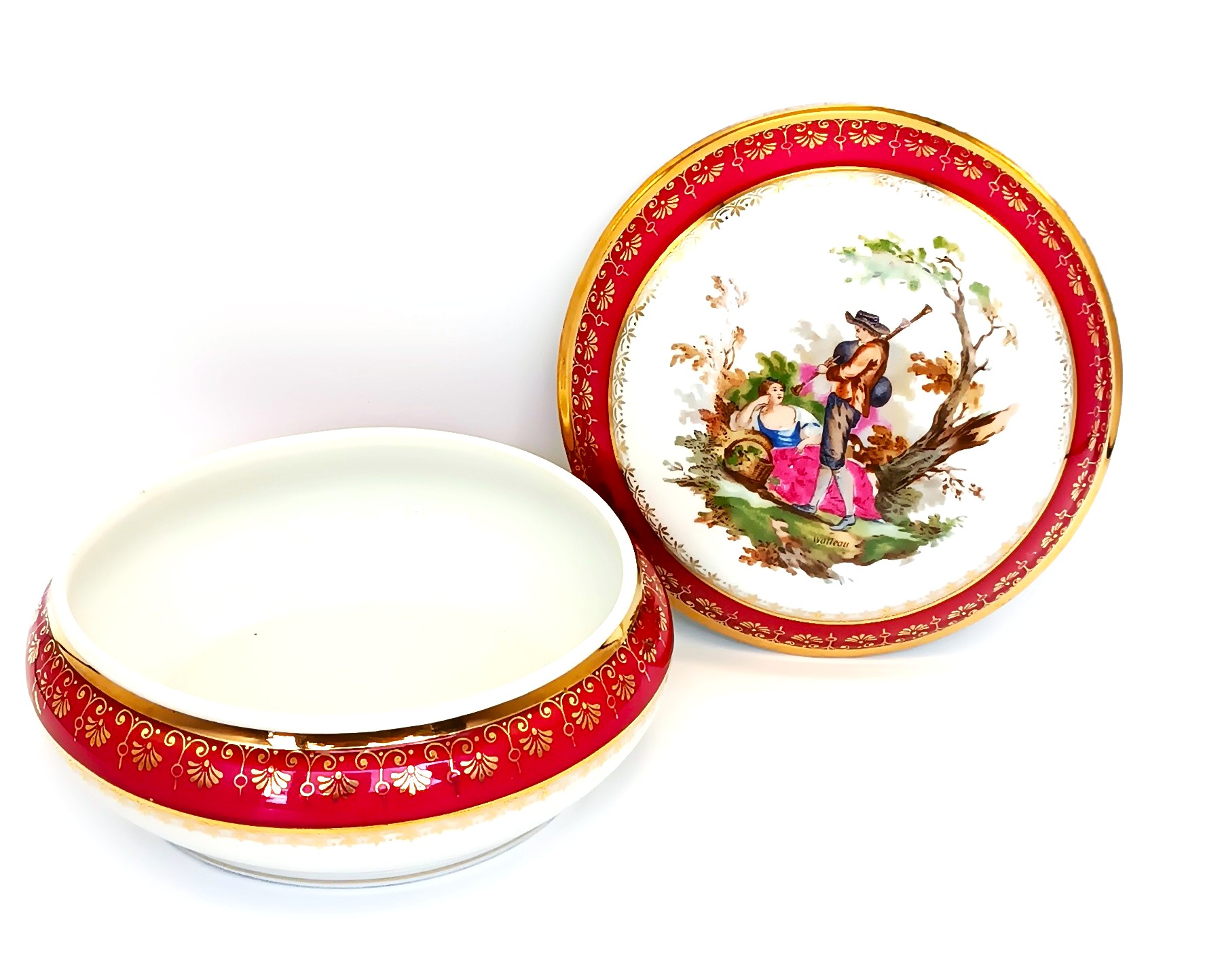 Open vintage Limoges France porcelain box with original Watteau-style decorated lid