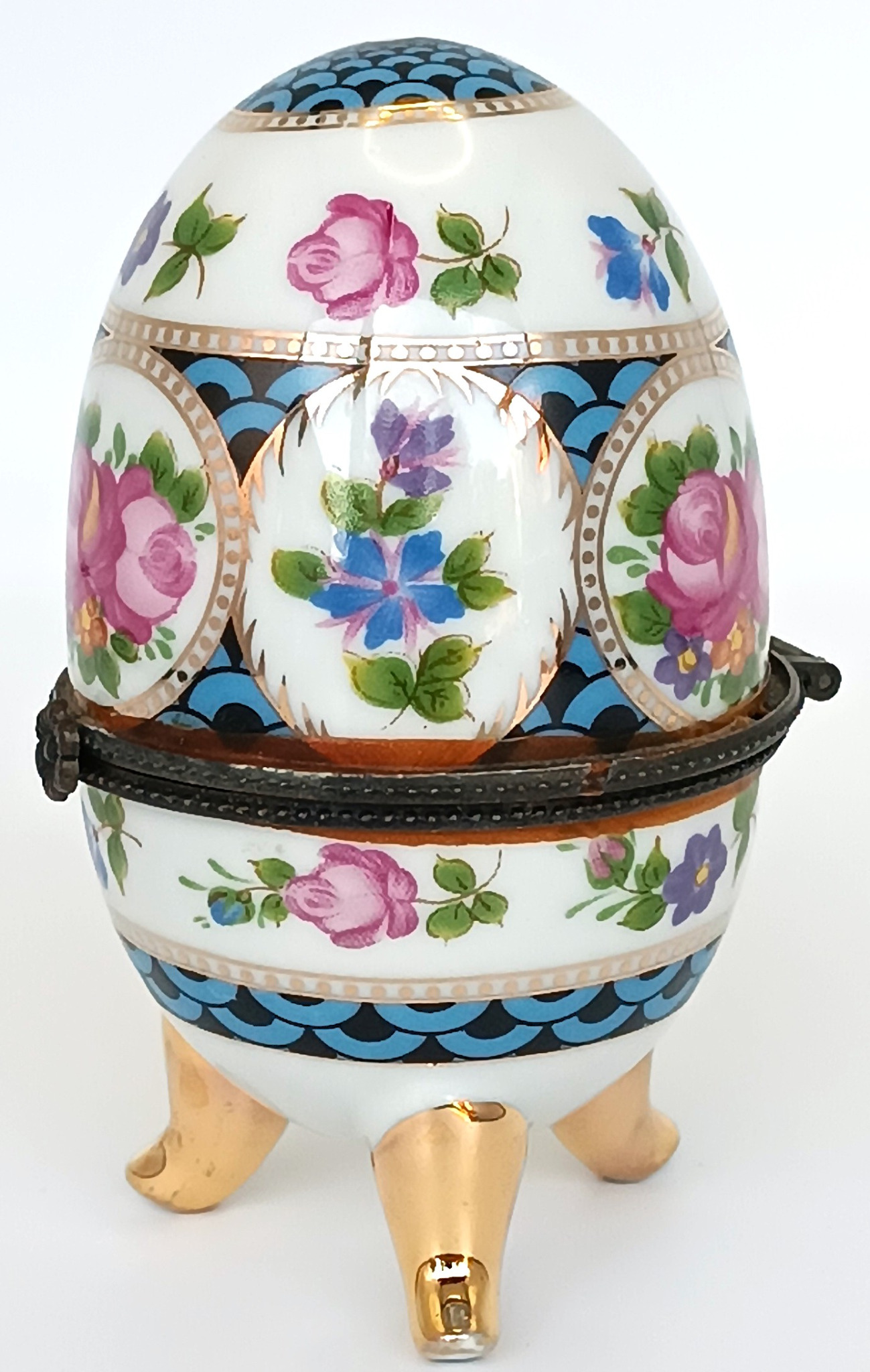 Vintage Vicko hand-painted porcelain egg trinket box with floral decoration, gilt accents and three feet