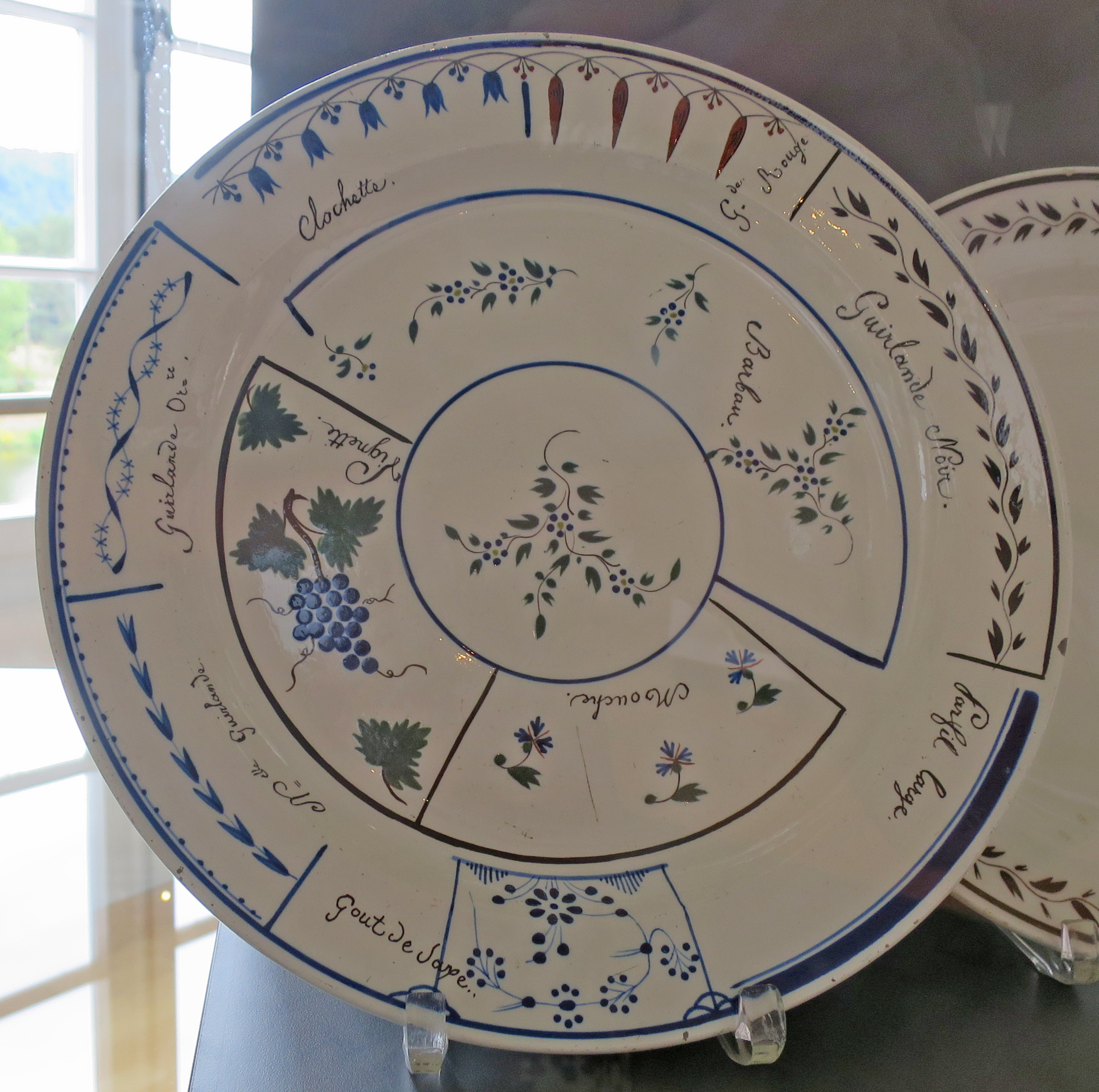 Historic Villeroy & Boch Mettlach sample plate showing different ceramic decoration patterns