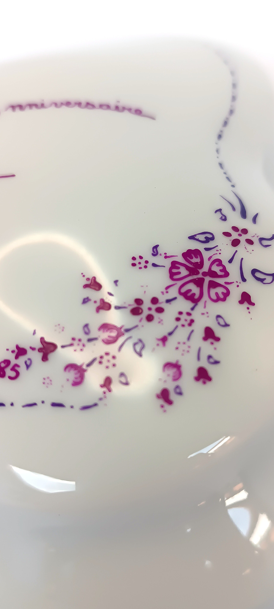 Purple floral decoration and 1985 anniversary inscription inside a vintage Limoges porcelain box lid