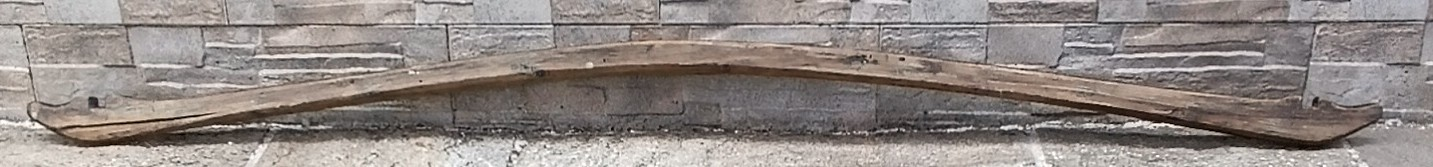 Full view of an antique Balkan wooden shoulder yoke from the Pavlikeni region of Bulgaria, dating to around 1900 and measuring approximately 153 cm