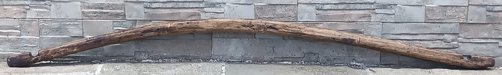 Full view of an antique Bulgarian wooden shoulder yoke from Central Bulgaria, dating before 1900 and measuring approximately 140 cm