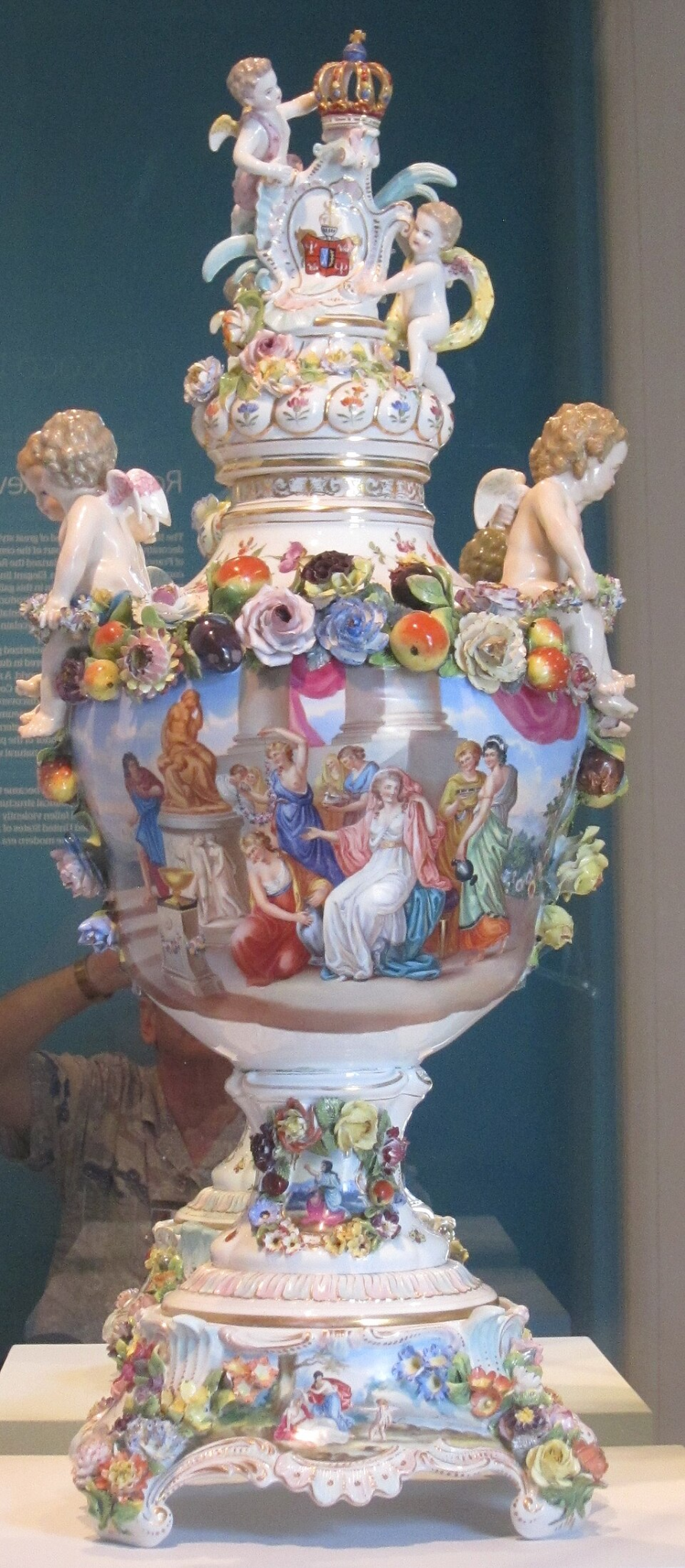 Dresden porcelain Carl Thieme monumental vase with putti, applied flowers, painted scenes and gilding, c. 1875–1890