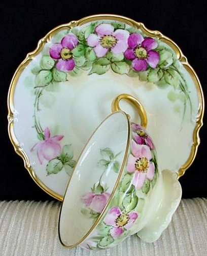 Hutschenreuther Selb Porcelain Cup and Saucer Hutschenreuther Selb Bavaria porcelain cup and saucer with pink floral decoration and gilded rims