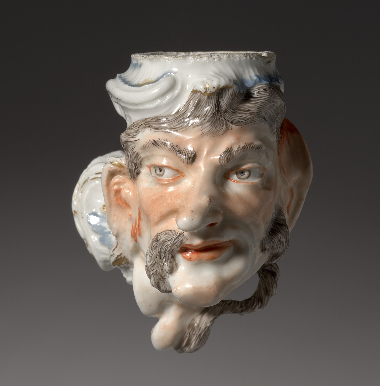 Nymphenburg Porcelain Pipe Head – Franz Anton Bustelli, c. 1755 Nymphenburg porcelain pipe head modelled as a male face by Franz Anton Bustelli, circa 1755