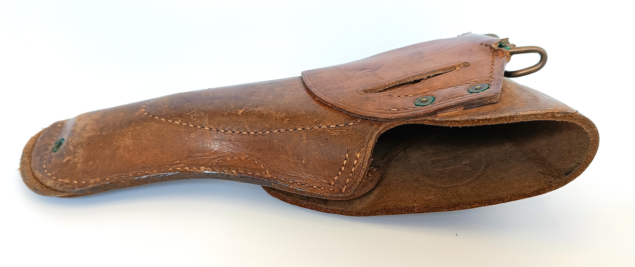 Open side view of an original U.S. M1916 leather holster for Colt M1911/M1911A1 with BOYT maker’s mark