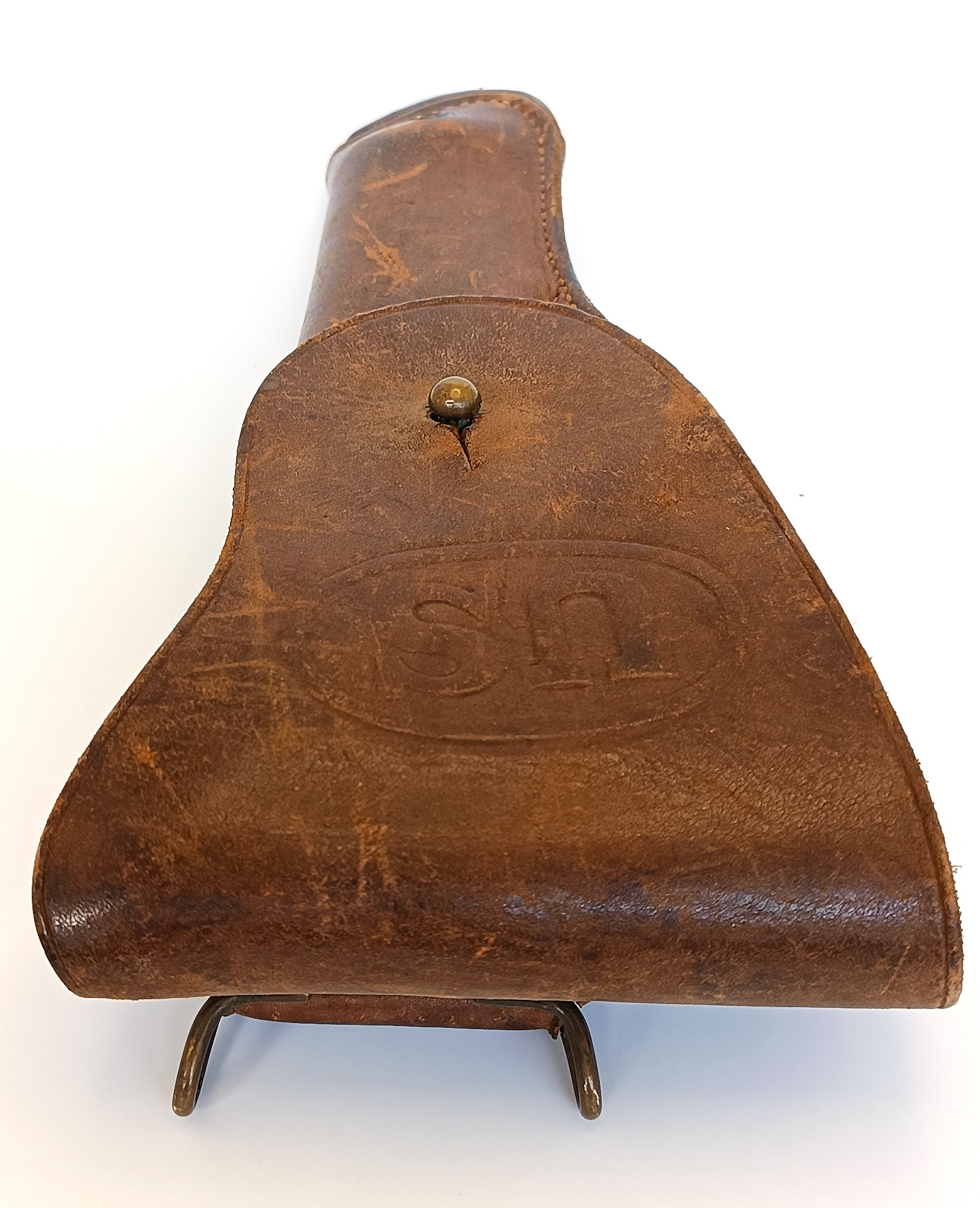 Front detail of an original U.S. M1916 leather holster for Colt M1911/M1911A1 with embossed U.S. marking