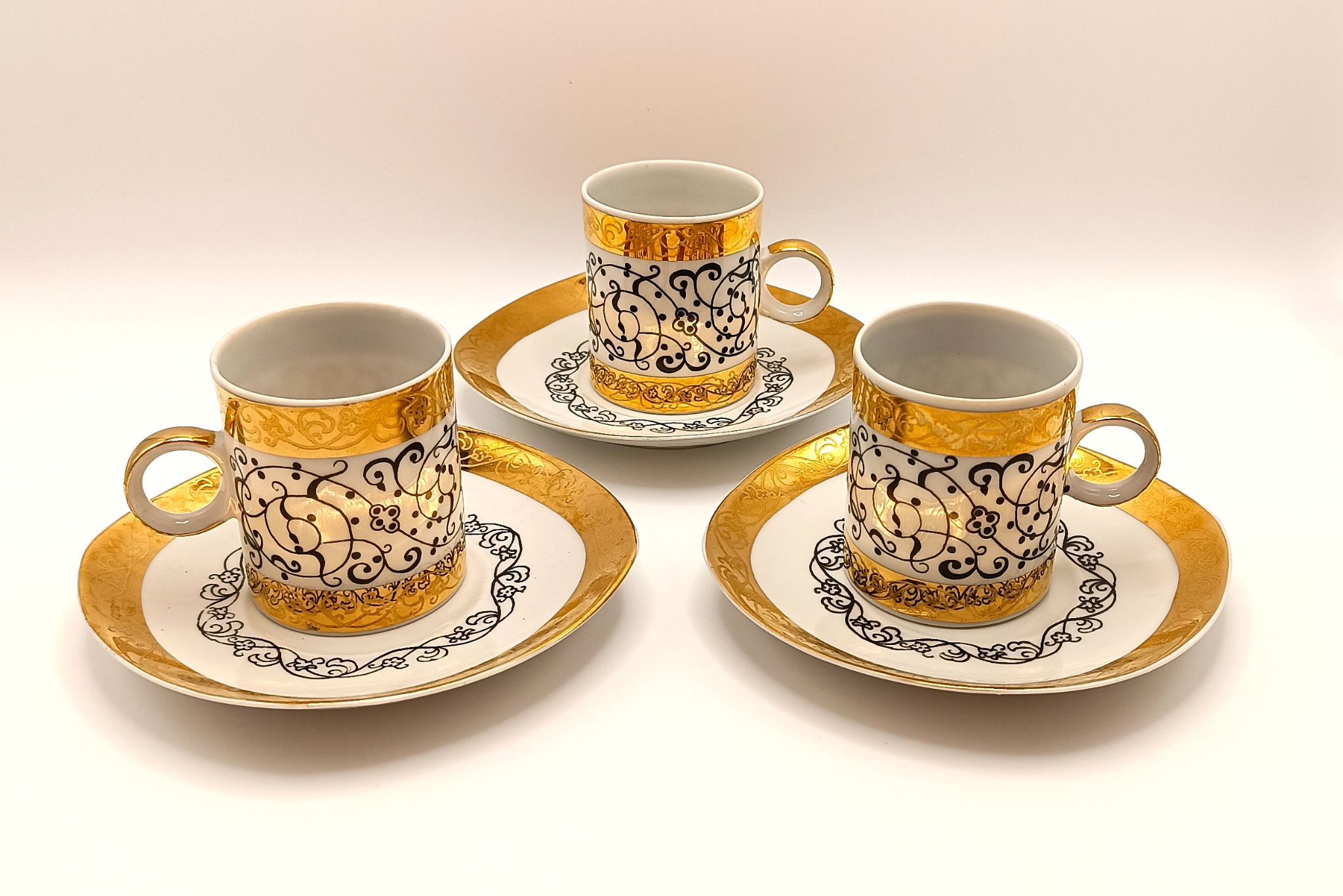 Rare Bulgarian EAB bone china espresso set with 24K gold decoration, 3 cups and 3 saucers
