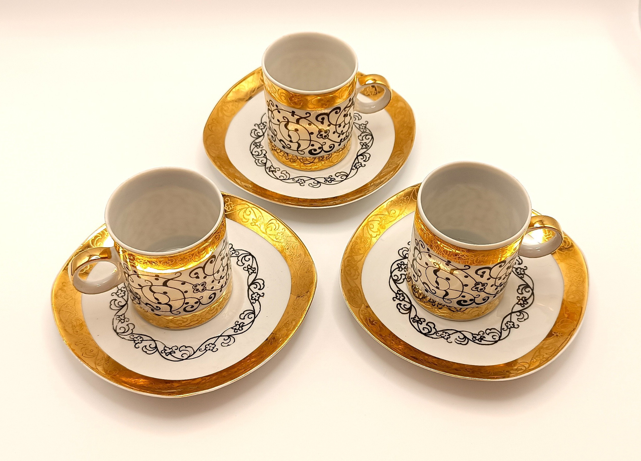 Rare Bulgarian EAB bone china espresso set with rich gold decoration, 3 cups and 3 saucers