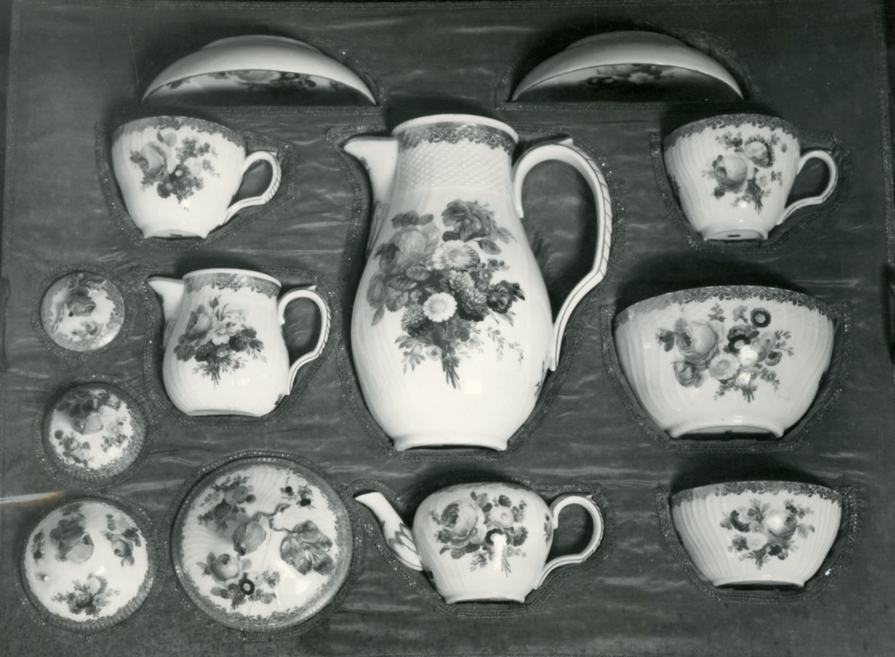 Royal Copenhagen porcelain service circa 1785 with hand-painted floral decoration, cups, saucers and serving vessels