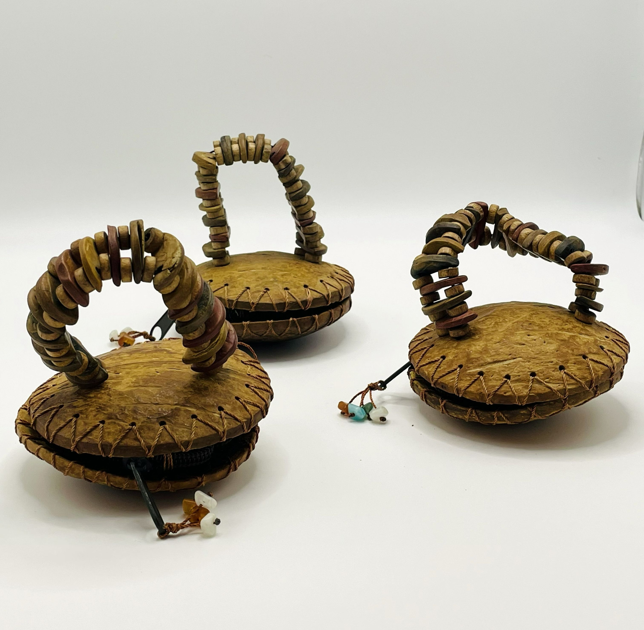 Set of 3 vintage handmade coconut shell purses with decorative handles, stitched edges and zip closures