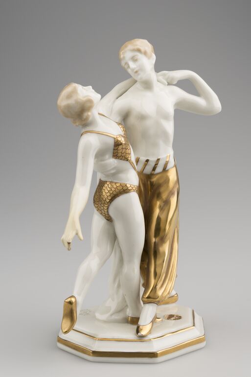 Sitzendorf porcelain acrobat couple dancing with gilded costume details after 1902