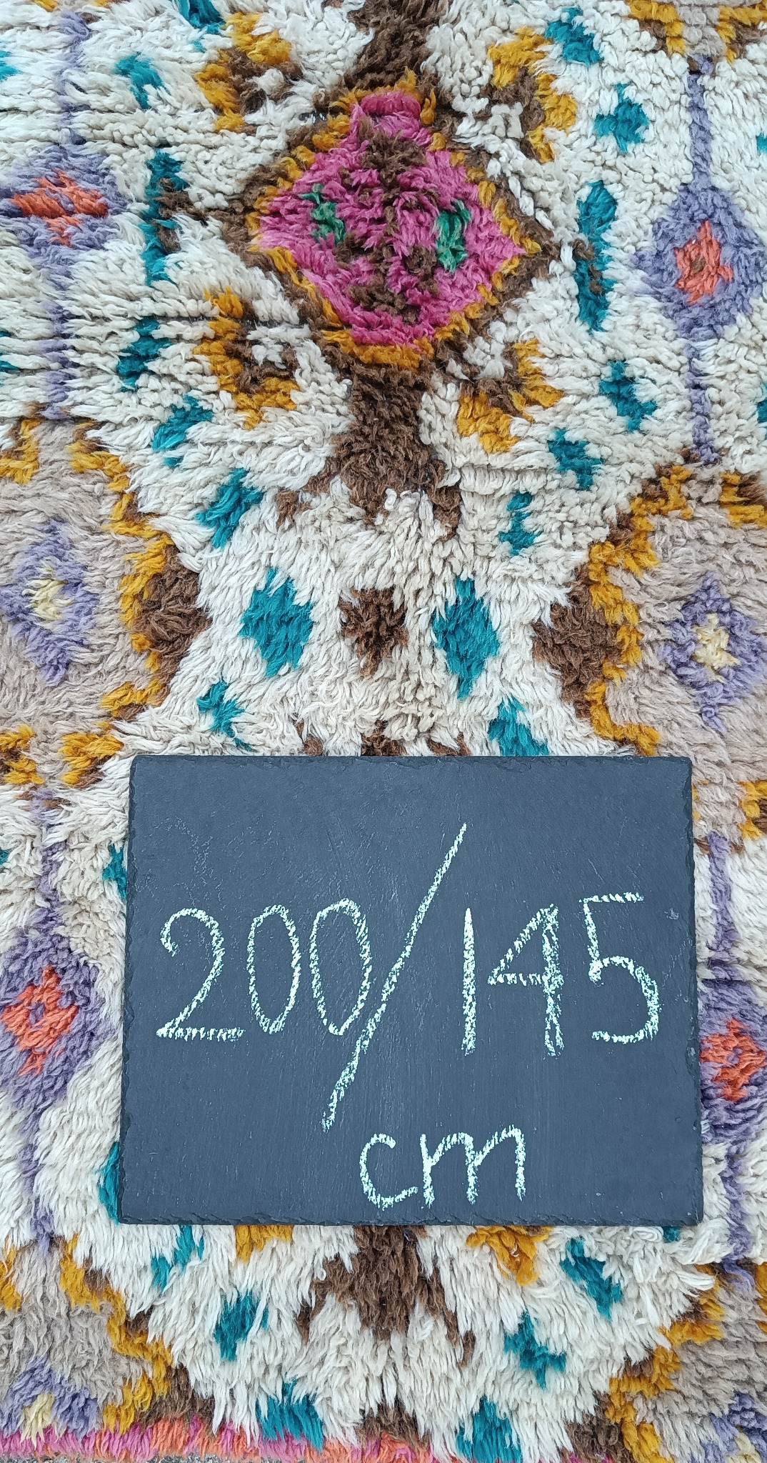 Vintage Bulgarian handwoven wool kitenik shown with documented dimensions of approximately 200 x 145 cm