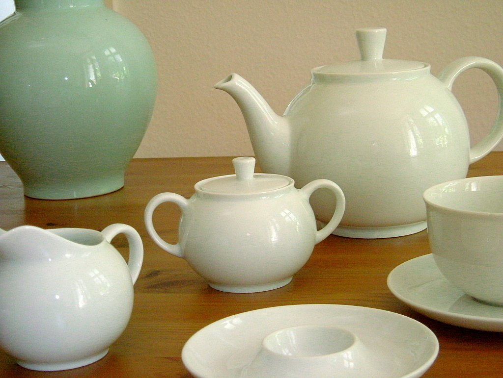 Original photograph of Arzberg Form 1382 porcelain tea service with white teapot, sugar bowl, creamer, cup and pale green vase