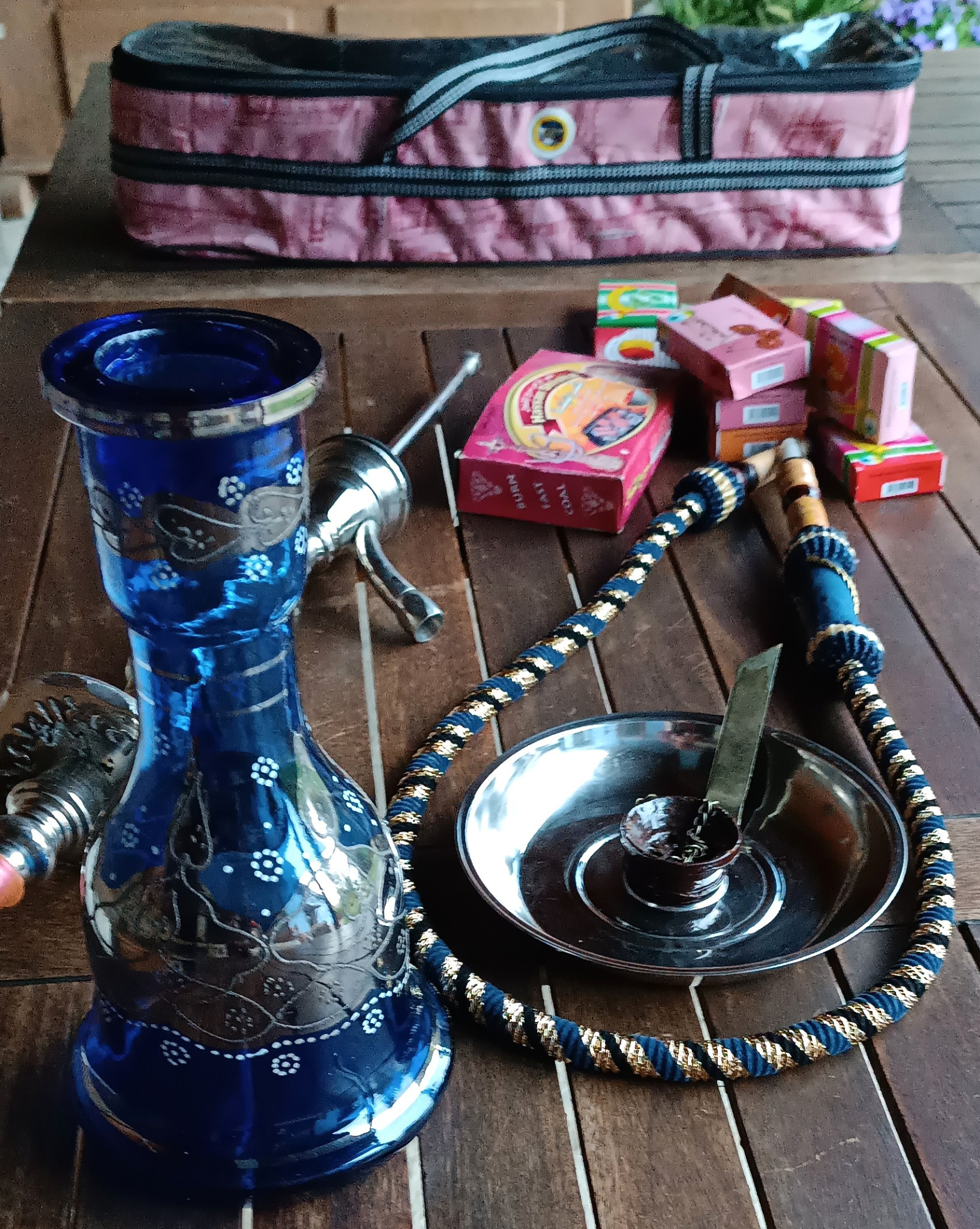 Disassembled vintage Yehia El Khawanky Egyptian hookah with cobalt-blue glass base, metal tray, original braided hose, wooden mouthpiece and carrying case